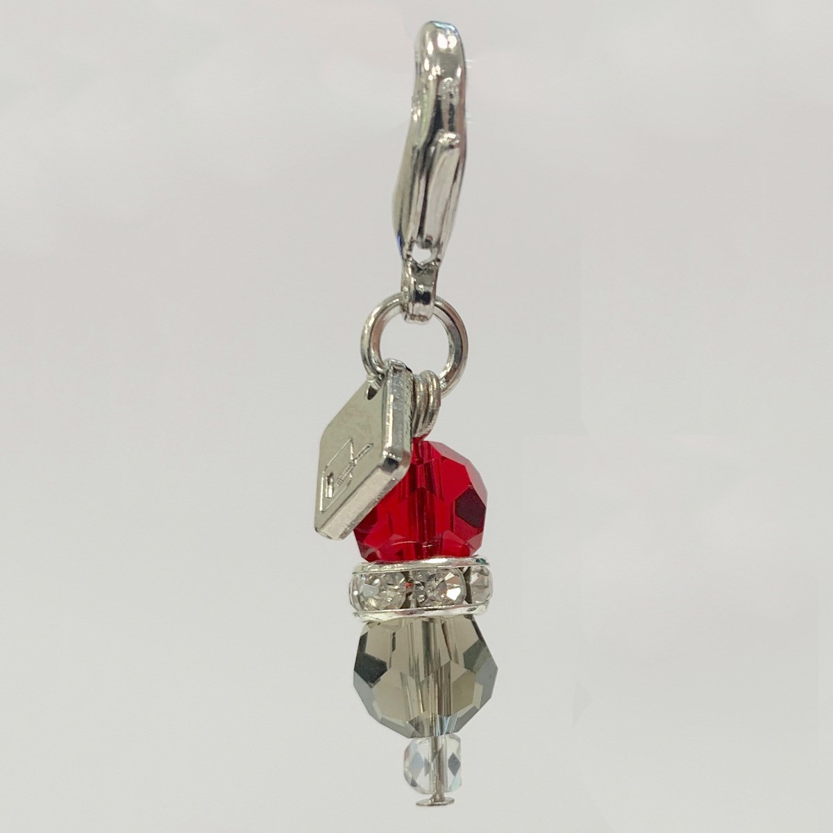 fly hood charm red