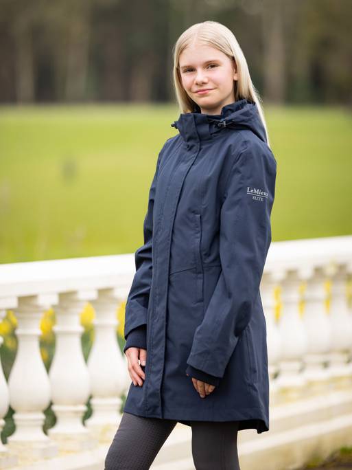 it03649_lifestyle_juniorprowaterproofcoat_navy_1_copy_1